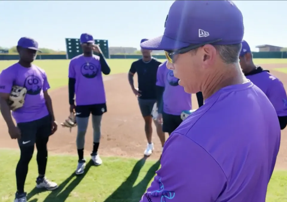 Doug Bernier teaching Rockies minor league infield prospects on the field during Fall Instructional League